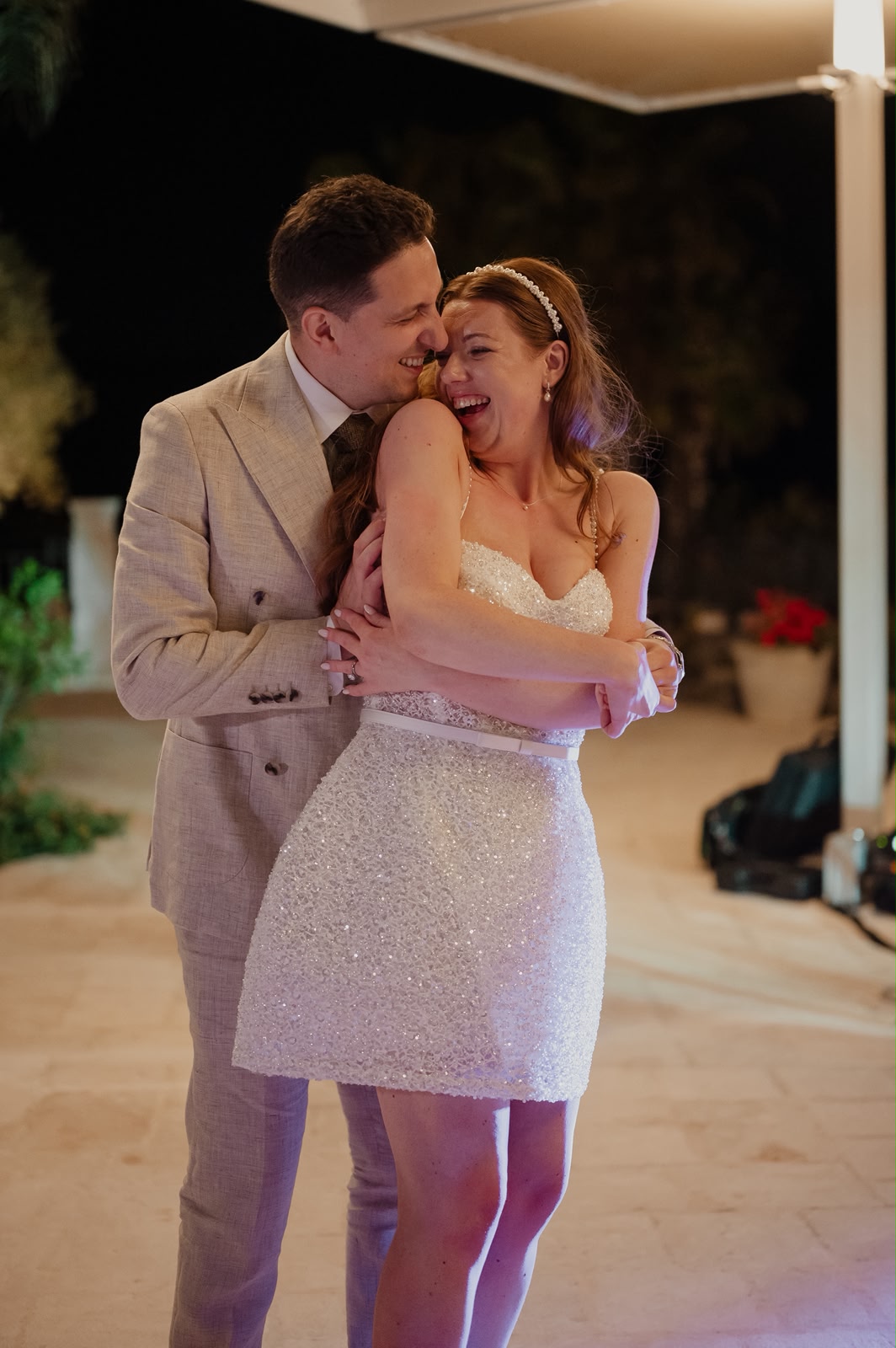 Newlyweds sharing their first dance at a Sicilian wedding reception