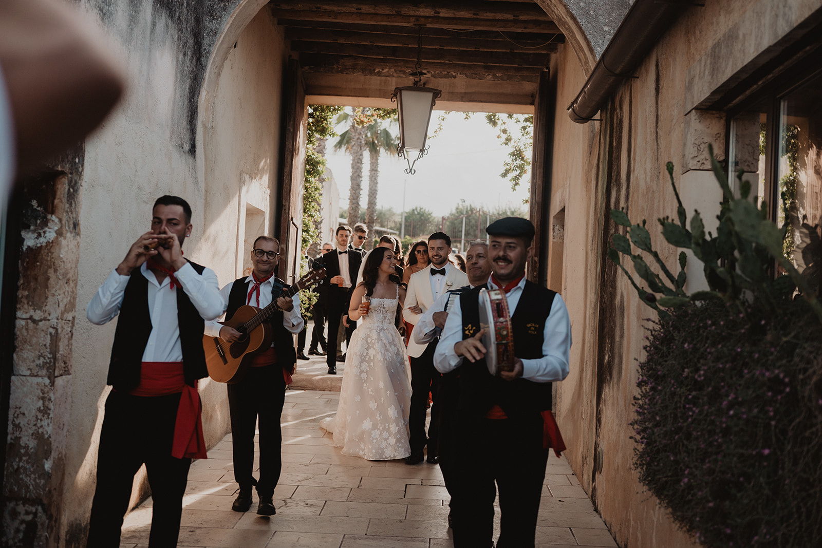 Traditional Sicilian musicians performing at a wedding