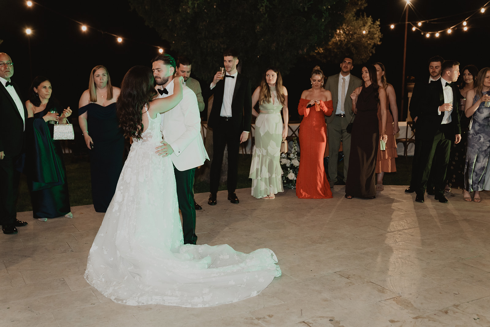 Lidia and Rian’s first dance under festoon lights